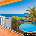 해외 부동산 임대 방법 - A vibrant coastal vacation rental scene on the Spanish Costa Blanca during summer, showcasing a styl...